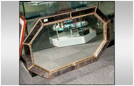 1950's Wall Mirror, oblong shaped with canted corners with a smokey glass border & gilded metal