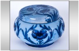 William Moorcroft Signed Florian Ware Blue on Blue Lidded Powder Bowl ' Poppy ' Design. c.1900-1906.