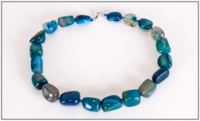 Teal Blue Agate Necklace, a strand of smooth tumbled agate beads, hand knotted on blue silk and