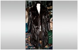 Ladies Full Length Ranch Mink Coat, fully lined. Collar with revers, slit pockets, scalloped