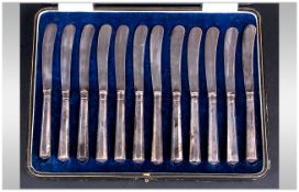 George V Boxed Set of 12 Silver Handle Butter Knives. Hallmark Sheffield 1921.