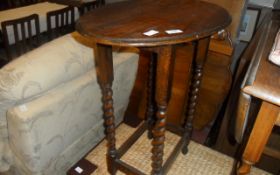 Dark Wooden Oval Table Turned Legs