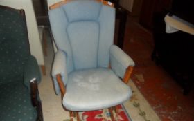 Light Wooden Rocking Chair With Light Blue Cushions