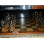 Wooden Chess Board with Medieval Figures as Chess Pieces.