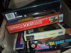 Box of Assorted Children's Games and Jigsaws.