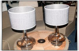 Pair Of Contemporary Glass Table Lamps Raised On Circular Chrome Bases With Modern Black And White