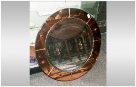 Art Deco Round Wall Mirror with a peach coloured glass edge with matching engraving. 27'' in