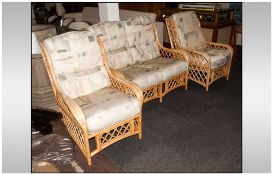 3 Piece Rattan/Bamboo Conservatory Suite, 2 armchairs, 1 settee, upholstered with loose cushions.