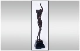 A 20th Century Contemporary Signed Bronze Figurine Raised On A Stepped Marble Base, A Standing