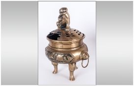 Chinese Bronze Antique Lidded After Incense Burner On A Tripod Legged Base, the body cast with birds