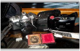 2 Cameras, MX Pentax ASAHI In Black Leather Case And A Canon Sure Shot EX Together With A