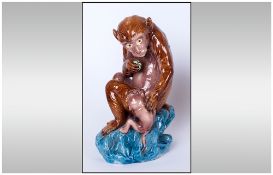 European Late 19th Century Figure of a Monkey, Sitting Upon a Rock Eating Fruit with Baby Monkey