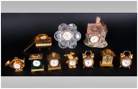 Collection Of Novelty Miniature Desk Clocks in form of piano, flower,alarm clock etc. (10)