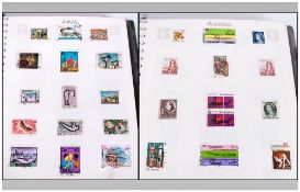 Three Green Boots Stamp Albums with all world stamps. One is commonwealth, the others rest of the