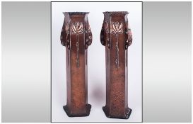 Pair Of Copper Embossed Arts & Crafts Vases with tin liners, decorated to the body with styalised