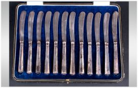 George V Boxed Set of 12 Silver Handled Butter Knives. Hallmark Sheffield 1921.