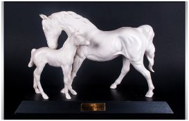 Beswick Horse Figure 'Mare & Foal' 'Spirit Of Affection' model number 2689 on wooden plinth.