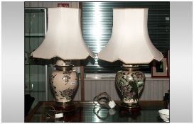 Pair Of Oriental Style Table Lamps Both Depicting Exotic Birds And Floral Decoration Raised On