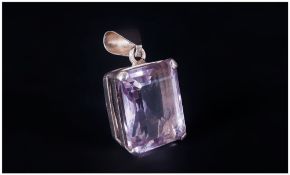 A Large Single Stone Emerald Cut Amethyst Set Silver Pendant. The Amethyst of Over 30cts. Marked