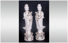 Two Chinese Blanc-de-Chine Dehua figures Of Guanyin Standing Amongst The Foliage, Height 12 Inches