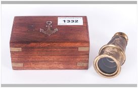 Small Wooden Box With Anchor Logo Containing A Small Brass Extending Telescope