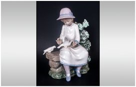 Nao by Lladro Figure ' Girl with Pair of Doves ' Seated. Height 8.5 Inches.