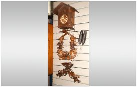Black - Forest Carved Wood Cuckoo Clock Carved To The Front with Birds and The Chicks In a Nest