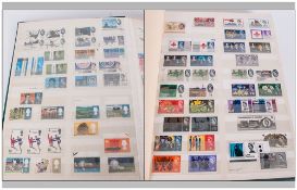 Green Stock Book OF Stamps, includes over fifty pounds worth of mint pre-decimal commemoratives,