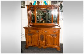 Edwardian Art Nouveau Style Carved Oak Mirror Backed Sideboard with a Mirrored Shaped Top, with Side