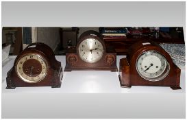 A Collection Of Wooden Cased 8 Day Striking Mantle Clocks Circa 1920/30. 3 in total. All in