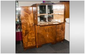 1930's Art Deco Walnut Veneered Cocktail Cabinet, with a Mirrored Adjustable Interior Veneered In