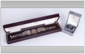 Antique Handmade Silver Bracelet, 7.25'' in length. Plus a pair of stone set silver earrings.