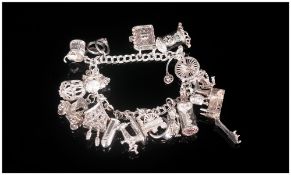 Silver Charm Bracelet, Loaded With 18 Charms, Weight 72 Grams