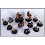 Collection Of 11 Miniature Animal Figures On Bases Together With A Hedgehog