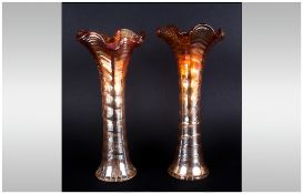A Pair Of Carnival Glass Vases, orange lustre colourway. Excellent condition. 10.25'' in height.