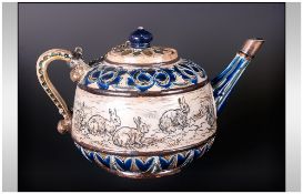 Doulton Lambeth Rare Teapot by Hannah Barlow decorated with incised images of rabbits and dated