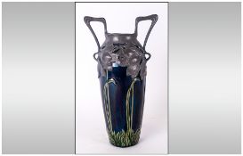German Art Nouveau Pottery Vase, Glazed In Blue and Greens Depicting Stems of Flowers to the Body.