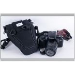 Canon EOS 700 film camera ;)  Camera with attached Canon Zoom Lens., E.F 35-80mm. Complete with