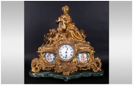 French 19th Century Ormalu Serves Mounted Mantle Clock in the rococo style. The two panels decorated