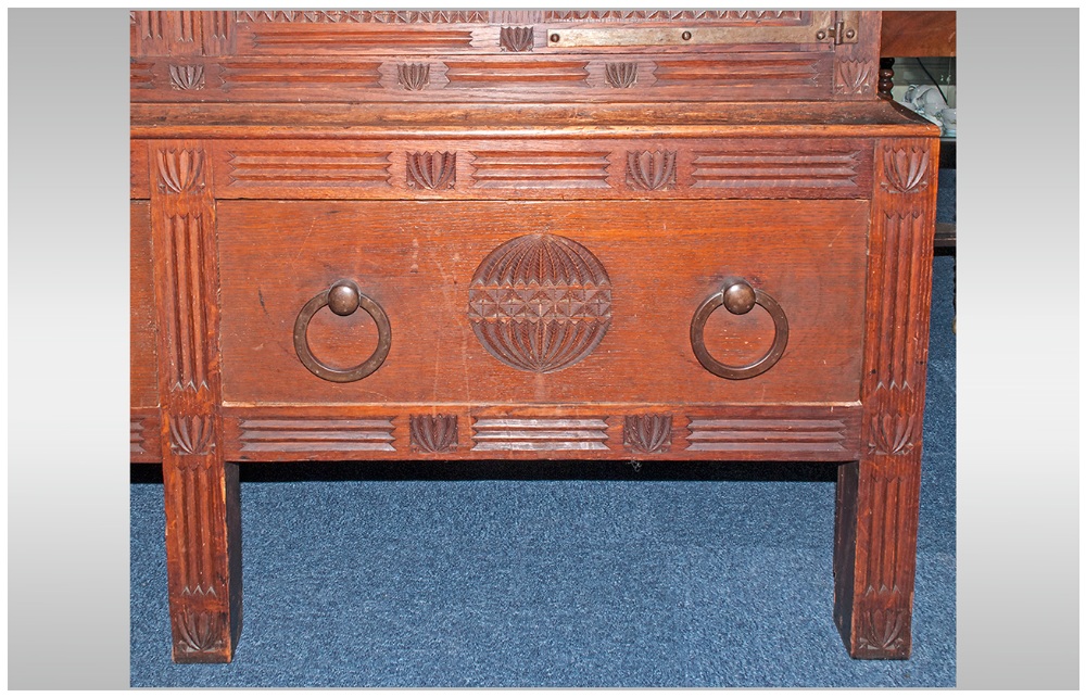 A Rare Aesthetic Movement Highly Carved Cabinet Cupboard In Oak. The top has three leaded top - Image 8 of 8