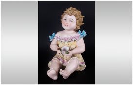 Victorian Quality Large Hand Painted Bisque Piano Baby Figure, in Sitting Position and  Holding A
