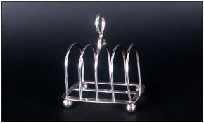 Edward VII Silver 4 Tier Toast Rack, Raised on 4 Ball Feet. Hallmark Sheffield 1905. Height 4.25