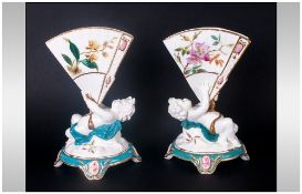 Minton Mid to Late 19thC Hand Finished Pair of Cherubs/Fan Vases  with date lozenge to under