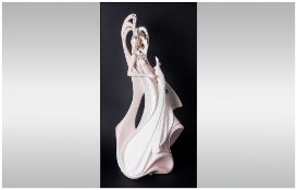 Galos Art Deco Style Hand Finished Porcelain Figure features a semi-naked female with exotic birds