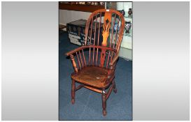 19thC Windsor Chair in ash and elm, of typical form. Spindled back with pierced splat.