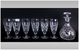 Cut Glass Decanter With Stopper together with 6 cut glass drinking glasses.