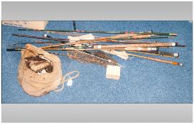 Collection of Split Cane Fishing Rods together with a canvas bag containing fishing reels and