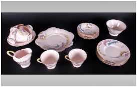 Tuscan China Part Teaset Fired in a pink glaze decoration in coloured flowers Pattern Plant, 6