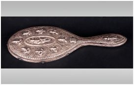 Indian Silver Ladies Hand Mirror Finely Embossed With Buddah Figures In Various Poses. 11'' in