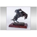 Frederic Remington Franklin Mint Bronze Sculpture Titled 'The Brono Buster' Circa 1988. Raised On